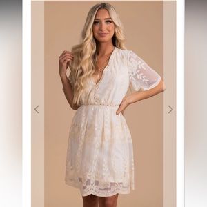 Bella Ella Boutique ivory dress. Medium. Knee/thigh length.